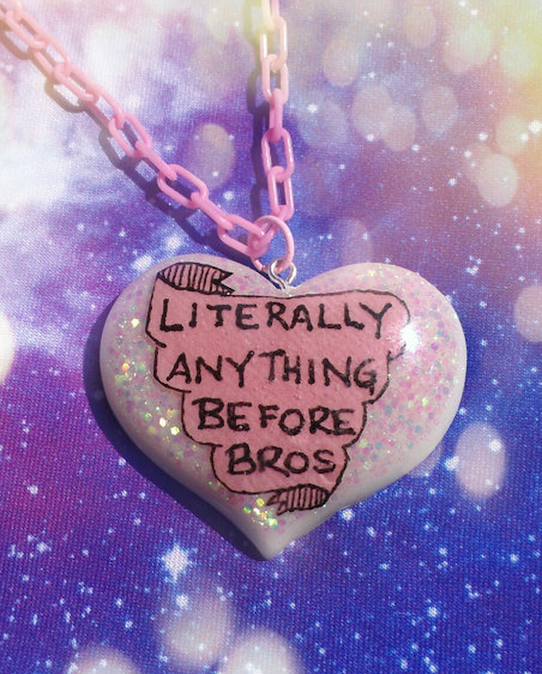 Sparkly pink pendant reading "Literally anything before bros"